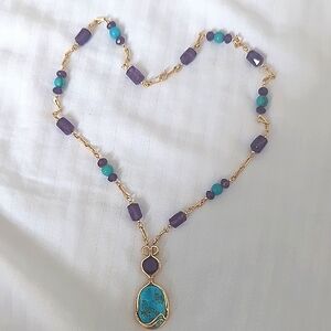 Elegant Gold and Purple Necklace with Turquoise Pendant